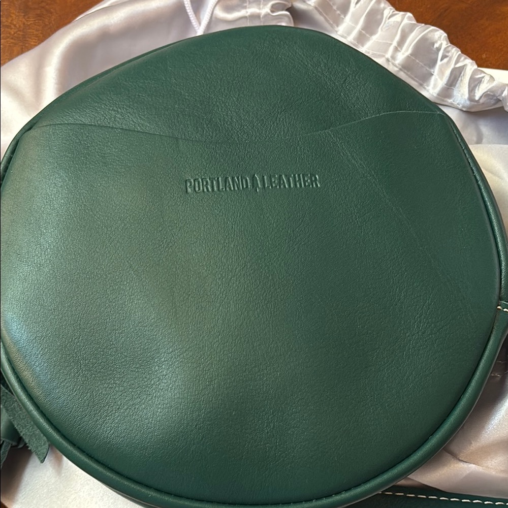 Peacock color Portland Leather large circle crossbody bag
